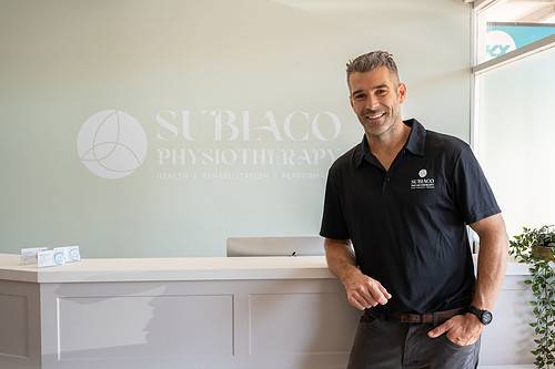 Dave Dawes of Subiaco Physiotherapy at the reception desk